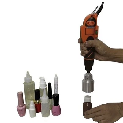 Mașină de captare a capacului șurubului